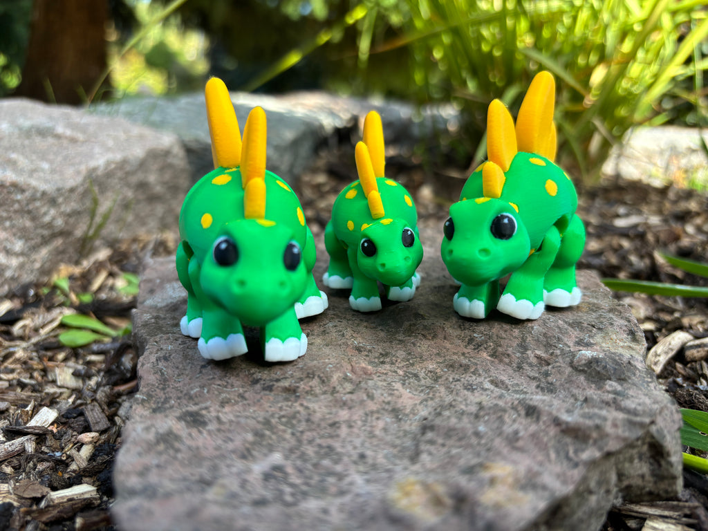 Sunny & Shadow, the Spiketail Stegos of Glimmer Fern Forest