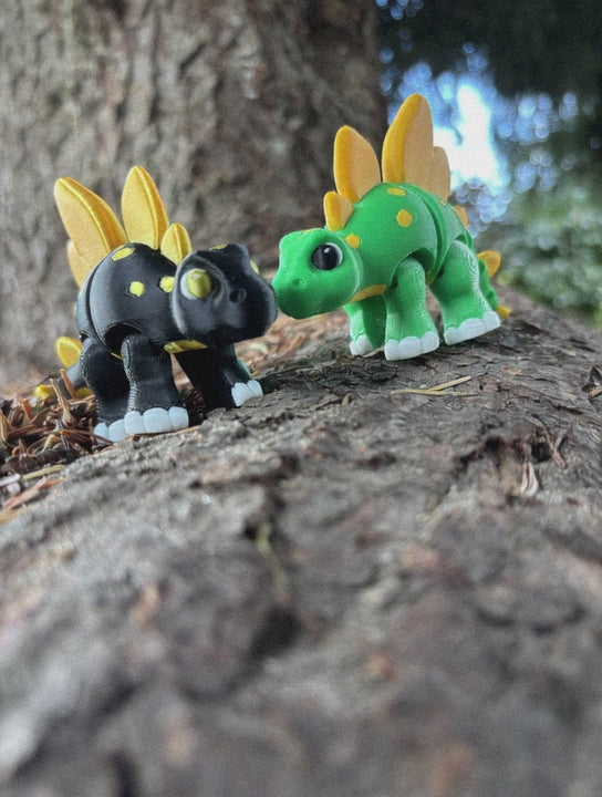 Sunny & Shadow, the Spiketail Stegos of Glimmer Fern Forest